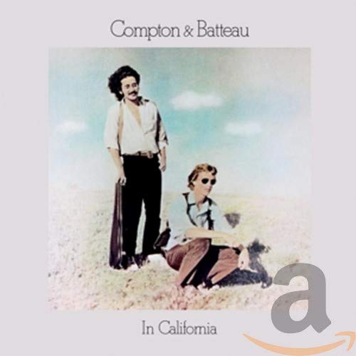 CD cover: two men in a field under a blue sky.