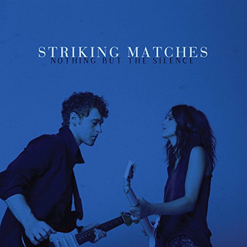 "CD cover with a man and woman holding guitars, blue-toned image."