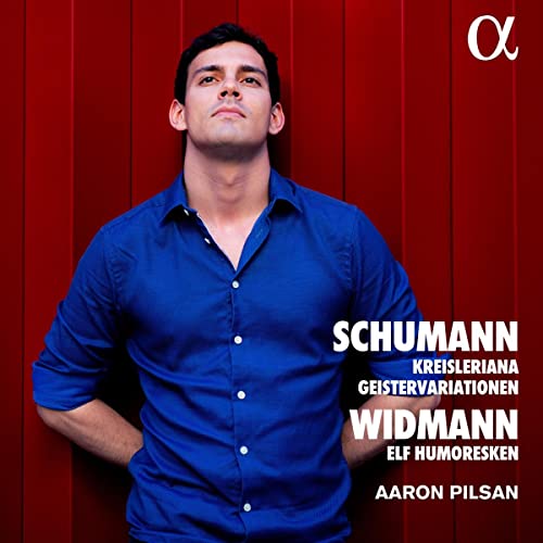 CD cover featuring pianist Aaron Pilsan in a blue shirt, red background.