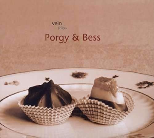 "CD cover with two desserts on a plate, text 'vein plays Porgy & Bess'."