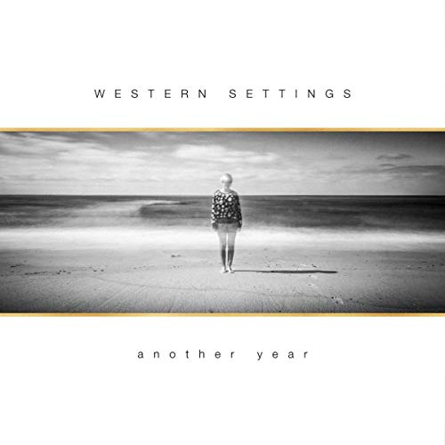 A vinyl album cover featuring a black-and-white photo of a woman on a beach.