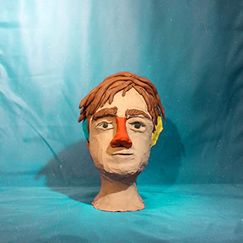 Clay sculpture of a human head with brightly colored details.