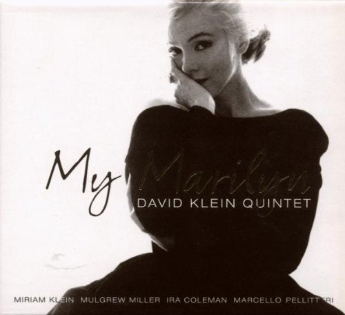Black and white album cover featuring a woman in a dark dress.