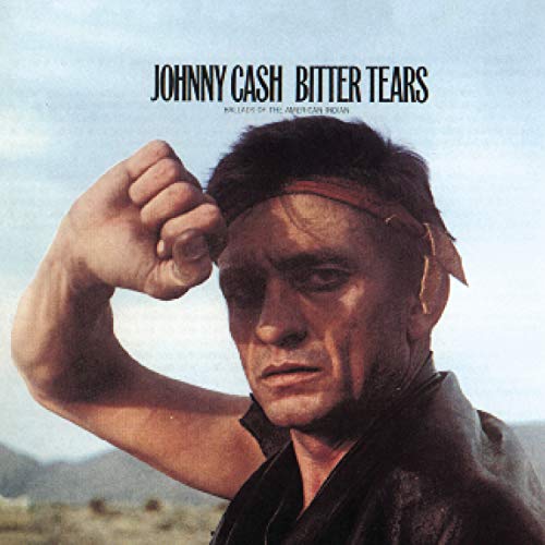 Johnny Cash album cover featuring a man with a bandana against a desert landscape.