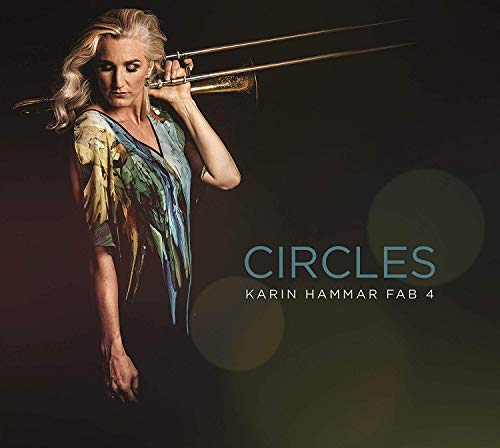 Album cover featuring a blonde woman holding a trombone on a dark background.