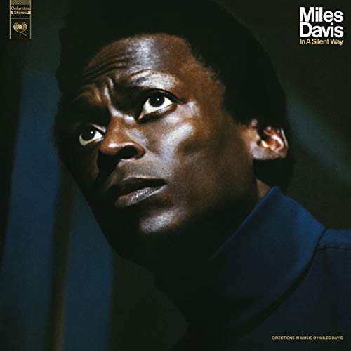 Vinyl record album cover featuring a close-up portrait of Miles Davis.