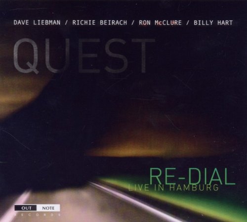 "CD cover with 'QUEST' in gray and 'RE-DIAL' in green on a dark background."