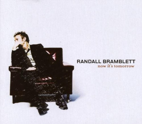 Randall Bramblett album cover featuring a man sitting on a couch, looking contemplative.
