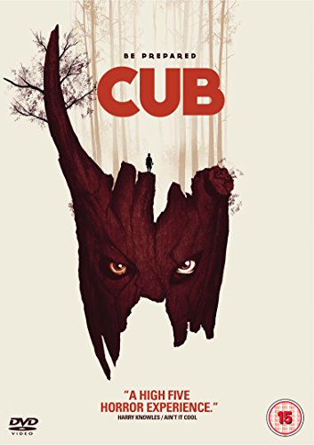 DVD cover for "Cub" featuring a menacing tree face with glowing eyes.