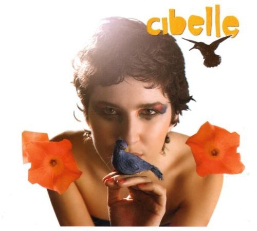 Album cover featuring a woman with a bird on her finger, surrounded by flowers.