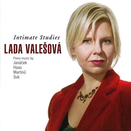 CD cover featuring a blonde woman in a red blazer and necklace against a white background.
