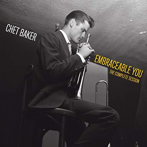 Chet Baker playing trumpet, album cover in grayscale tones.