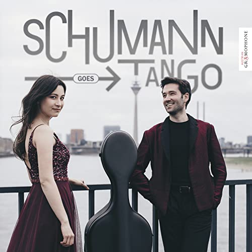 CD cover featuring a couple and a double bass with city backdrop.