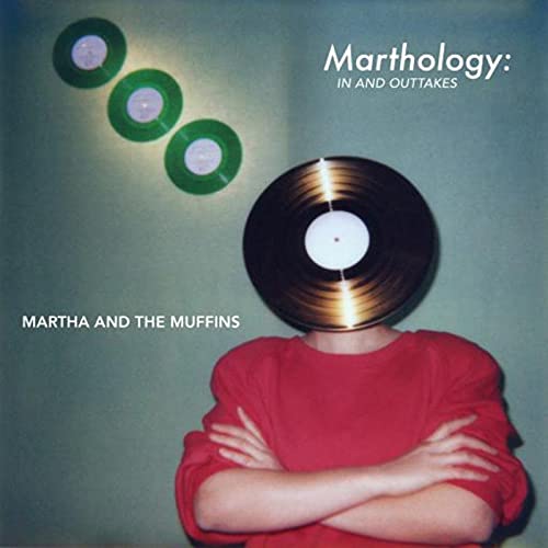 Album cover for Martha And The Muffins, with a record over a person’s head.