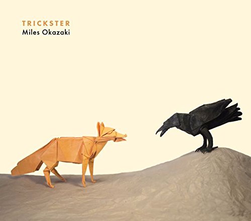 Origami fox and crow on sand, beige background, album cover art.