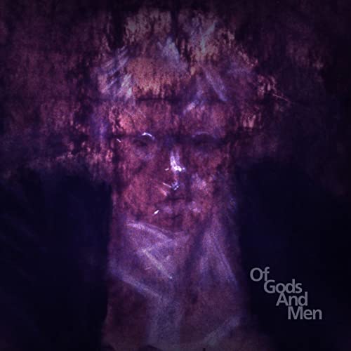 Dark, textured portrait with the album title "Of Gods And Men" below.