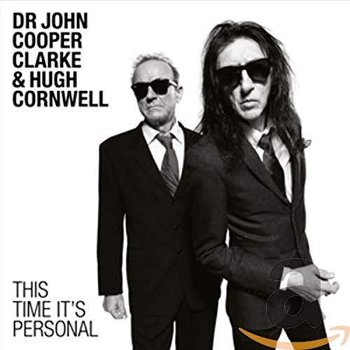 Black and white CD cover featuring two men in suits and sunglasses.