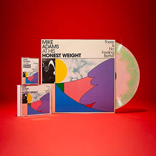 Album cover for "Mike Adams At His Honest Weigh" with vinyl record.