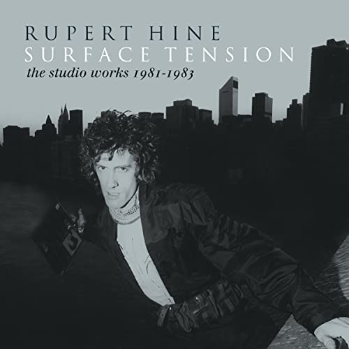 Rupert Hine album cover: portrait of a man with a city skyline.