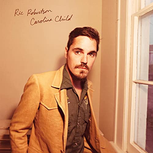 Album cover for Ric Robertson’s “Carolina Child” featuring a portrait of a man.