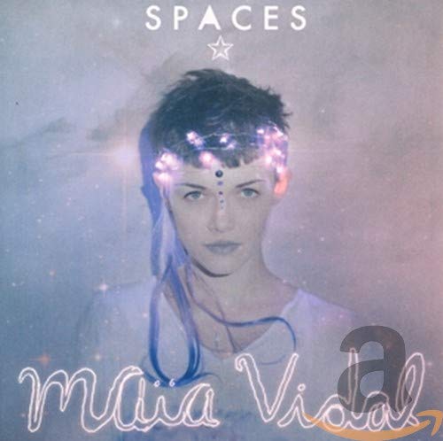 CD cover for Maia Vidal’s “Spaces” featuring a woman with glowing lights.