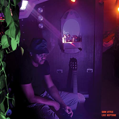 Album cover for Son Little’s “Like Neptune” featuring a man and guitar.