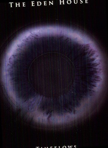 "Album cover featuring a close-up of a blue eye on a black background."