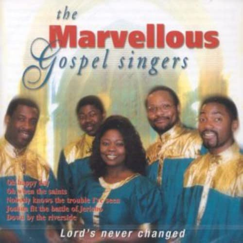 CD cover featuring five smiling gospel singers in gold robes.