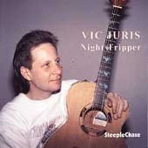 Vic Juris album cover featuring a man with a guitar.
