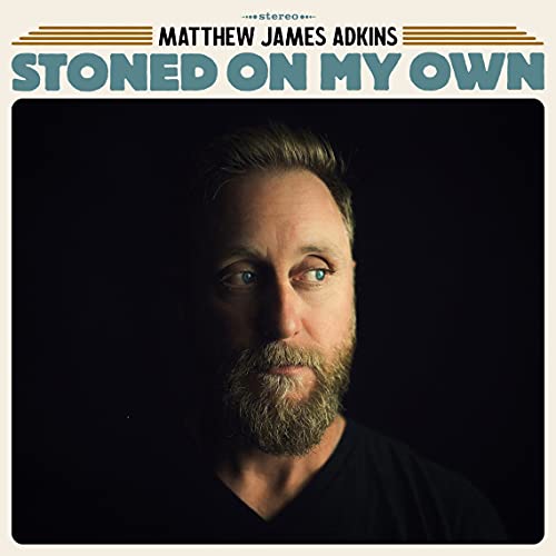 CD cover featuring a portrait of musician Matthew James Adkins.