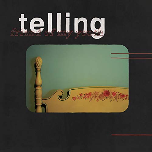 A vinyl record cover featuring a bed frame with floral designs.