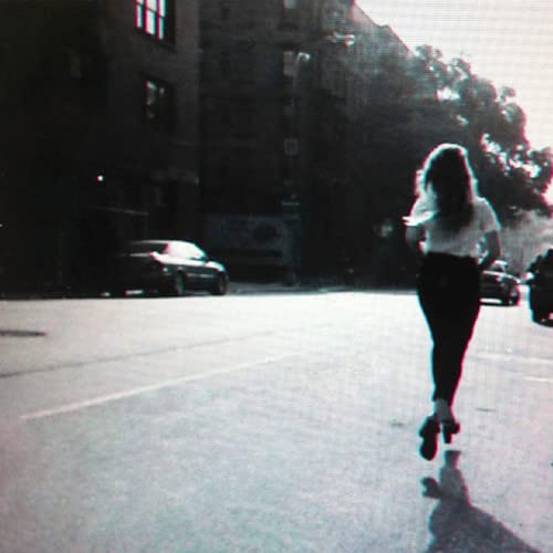 Woman walking away down a city street, glitch effect applied.