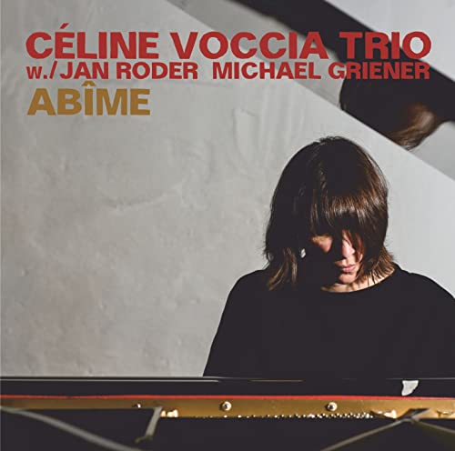CD cover featuring Céline Voccia with piano, titled "Abime" in gold text.