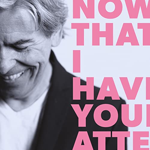 CD cover featuring a smiling man and pink text reading "Now That I Have Your Attention".