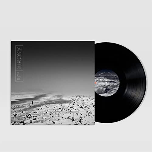 Asgeir vinyl record with album cover showing a lone figure on a beach.