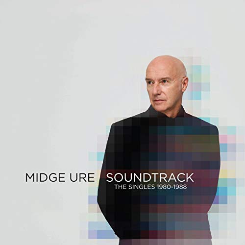 "Midge Ure album cover featuring a bald man in a black shirt."