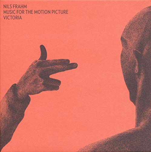Red album cover for Nils Frahm’s “Victoria” soundtrack, featuring a hand gesture.