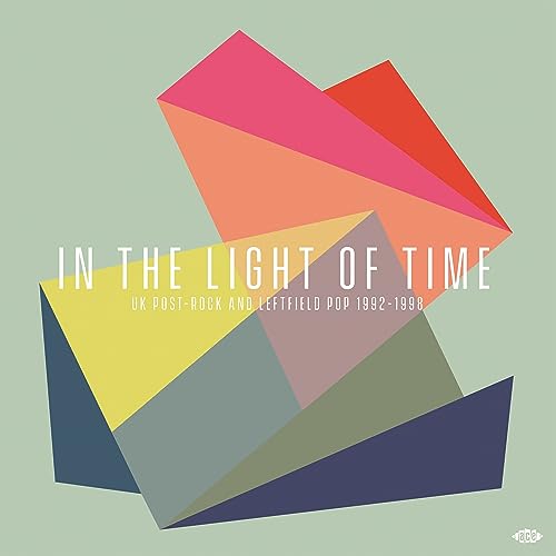 Album cover: geometric shapes in pink, orange, yellow, and gray.