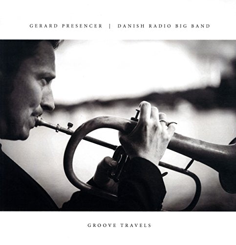 Black and white album cover featuring a trumpet player in profile.