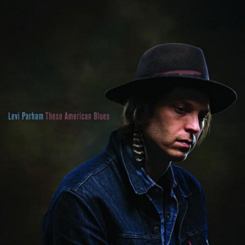 Man wearing denim shirt and hat, with text "Levi Parham These American Blues".