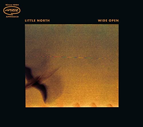 CD cover for Little North’s “Wide Open,” featuring a grainy, golden landscape.