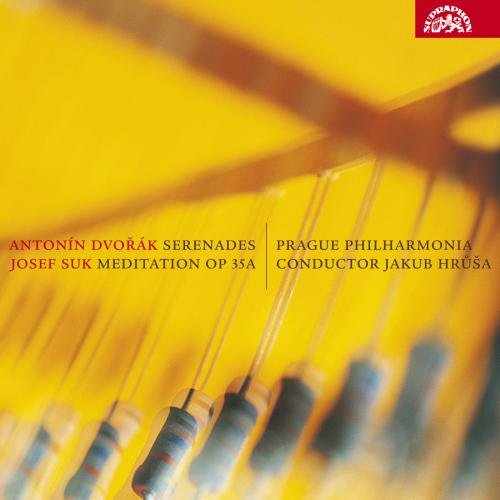 "CD cover featuring a close-up of piano strings on a yellow background."
