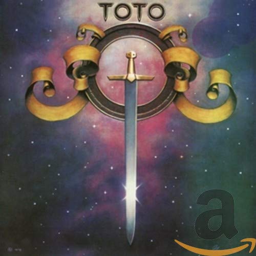 Toto album cover featuring a sword and ornate gold emblem on a nebula background.