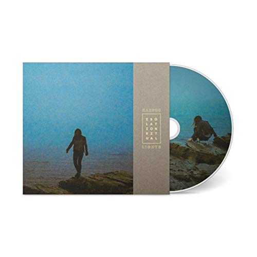 CD case with a person on a rocky shore, foggy background, and matching CD.