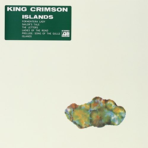 Islands" vinyl album cover: green and yellow abstract shape on white.