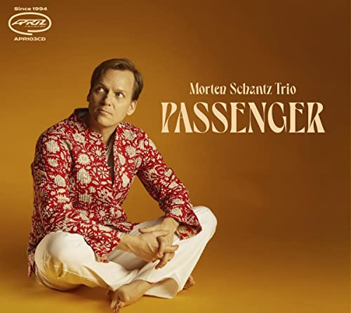 CD cover featuring Morten Schantz, seated in a patterned shirt.