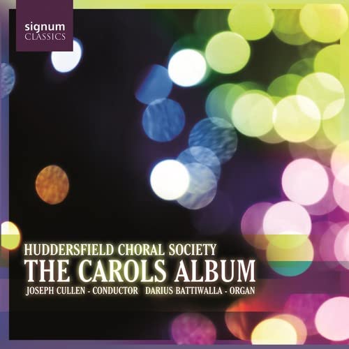 CD cover for "The Carols Album" by Huddersfield Choral Society, with bokeh lights.
