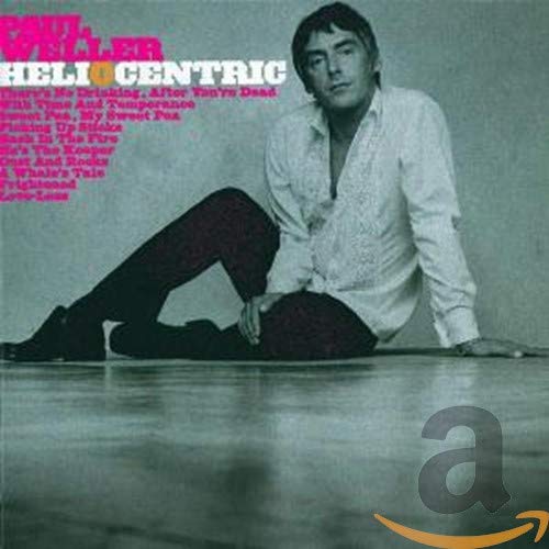 Paul Weller album cover, Heliocentric, showing him seated and looking forward.