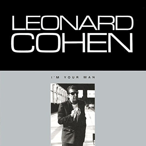 Leonard Cohen album cover featuring a black and white photo of him holding a banana.