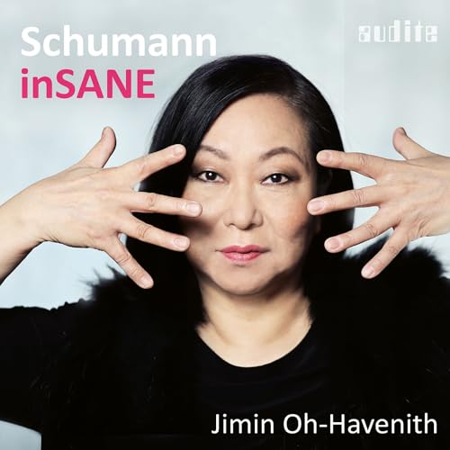 Pianist Jimin Oh-Havenith portrait with hands framing her face, album cover.